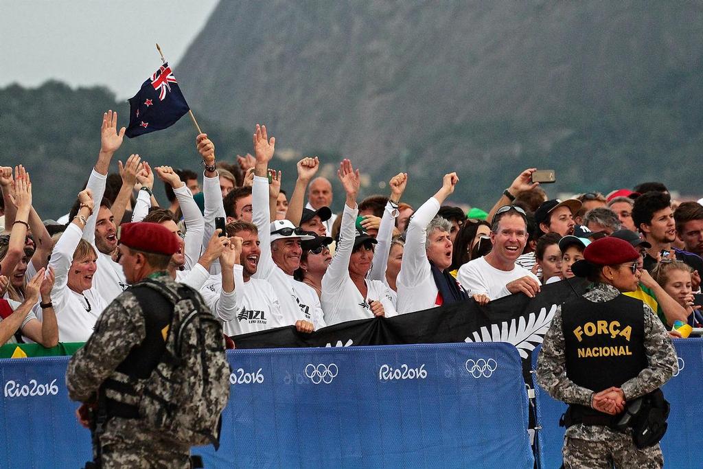 Kiwi fans are ecstatic as the 49er Gold medalists enter the Medal presentation arena © Richard Gladwell www.photosport.co.nz